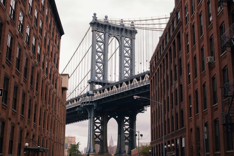 Manhattan Bridge framed by New York buildings